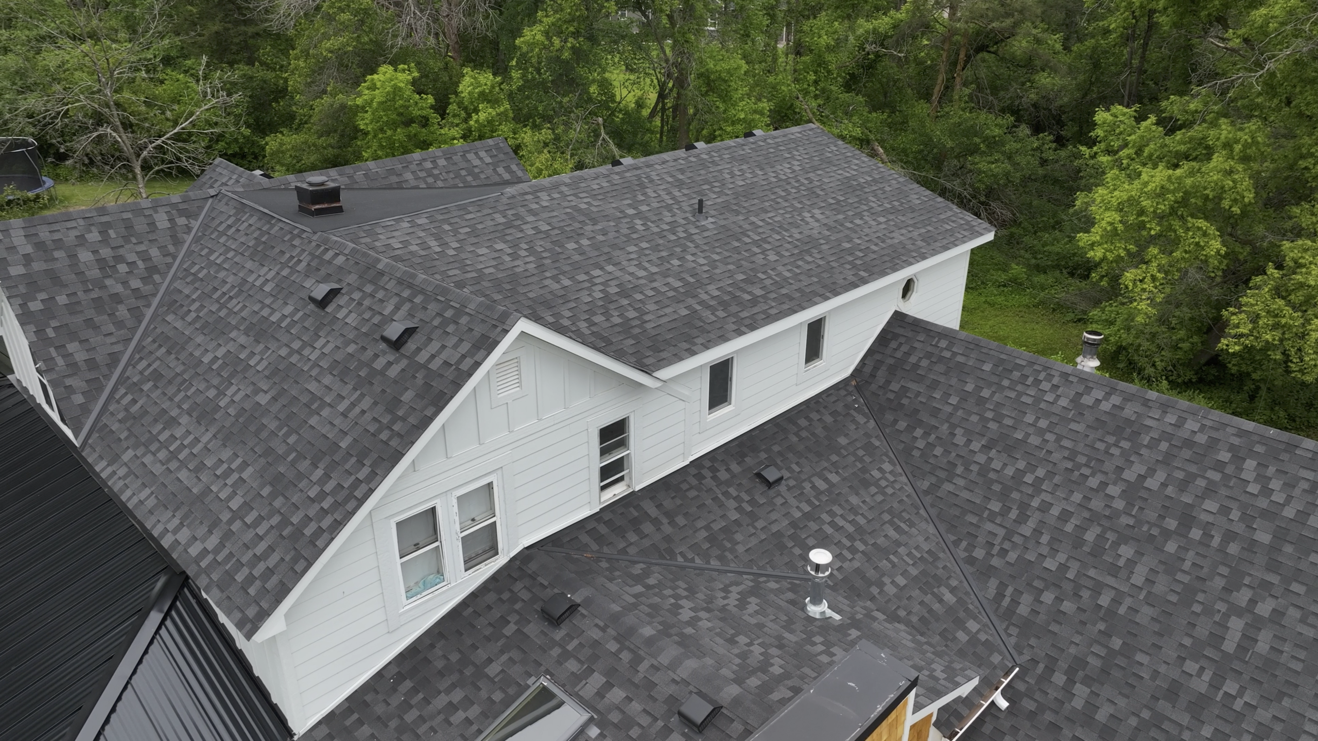 Asphalt shingle roofing services by ManePoint Exteriors